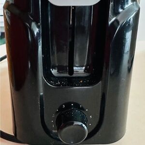 Stylish Black Toaster with Adjustable Dial